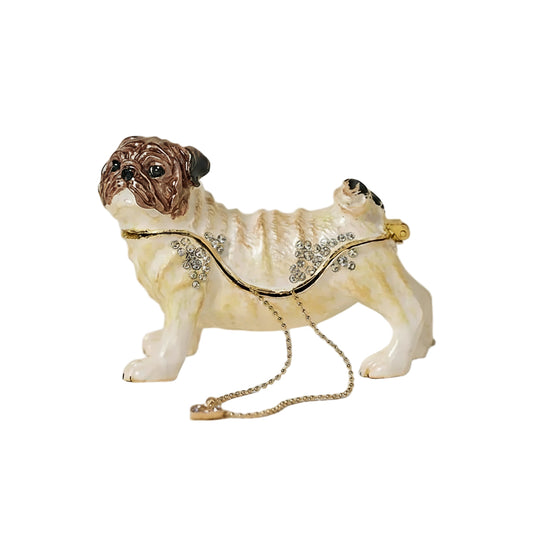 Add charm to your vanity with this pug-shaped trinket box featuring rhinestone details and a magnetic closure. A perfect gift for dog lovers and home décor enthusiasts.